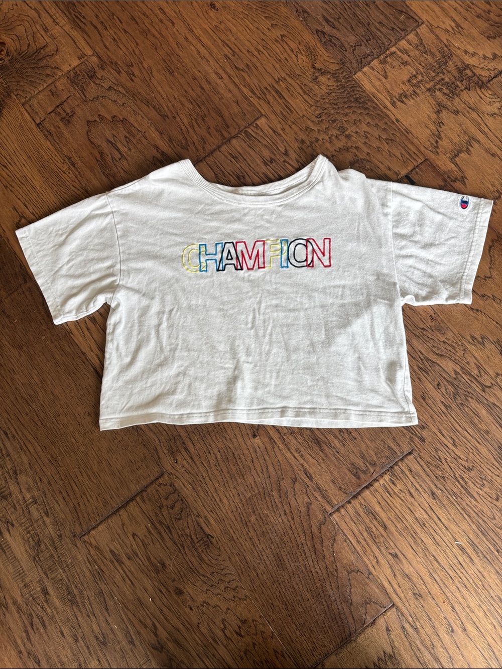 Champion White Boxy Crop Tee with Red, Blue, Yellow & Black Logo